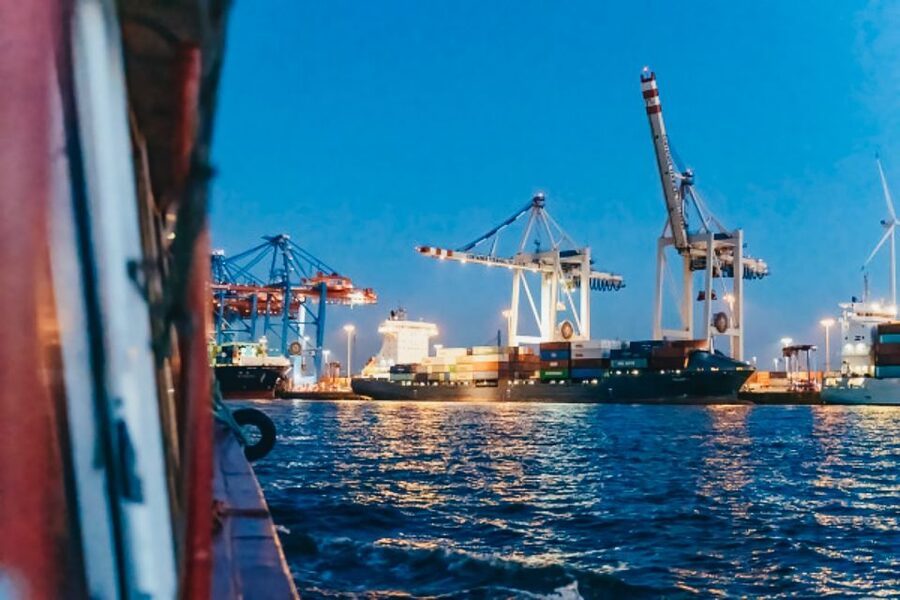 Hamburg: 1.5h Grand Harbor Evening Lights Cruise - The working port side: container bridges, ships, and real maritime scale