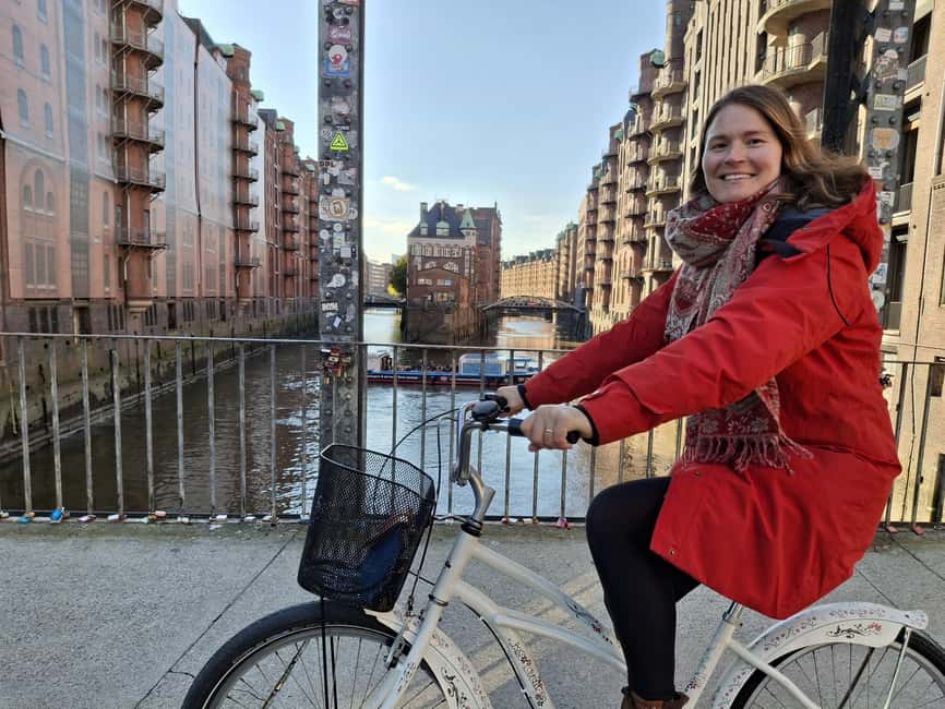 Hamburg: City Tour by Bike with Elbphilharmonie - A path across the flood protection system, watching the Elbphilharmonie from below