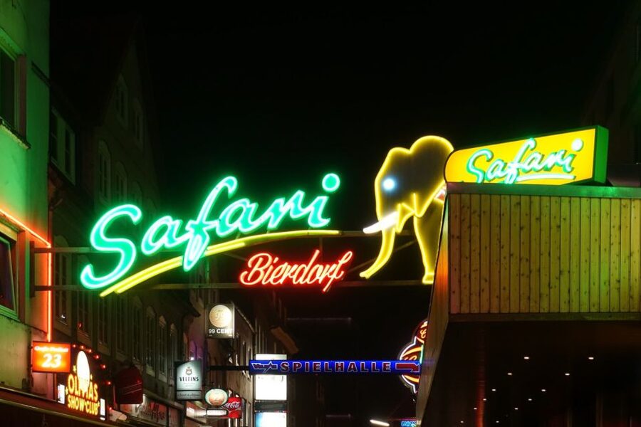 Hamburg: In the Footsteps of "Olivia" Reeperbahn Tour - Reeperbahn landmarks: Dancing Towers, Panoptikum, and Beatles Square