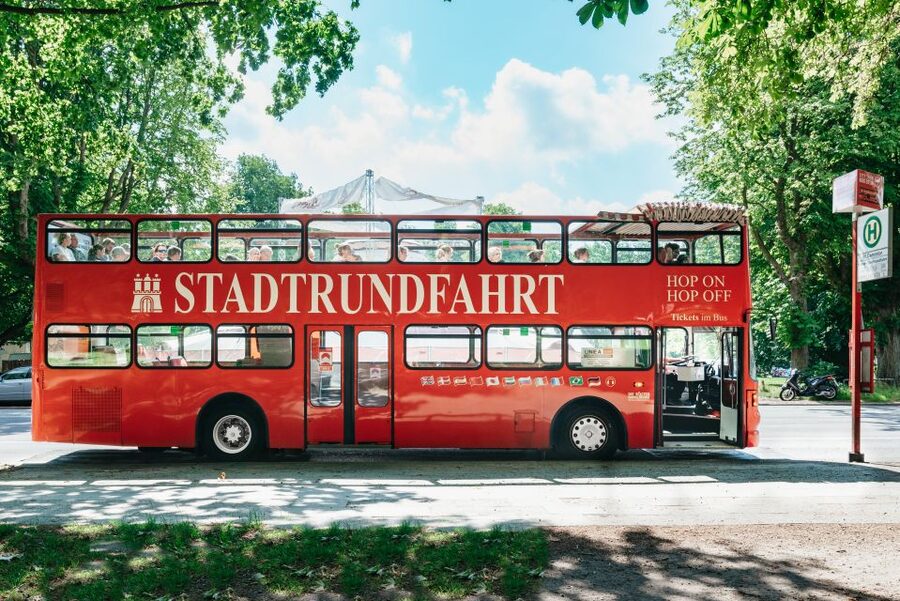 Hamburg: Line A Sightseeing Hop-On Hop-Off Bus Tour - Boarding the red double-decker at Landungsbrücken or Central Station
